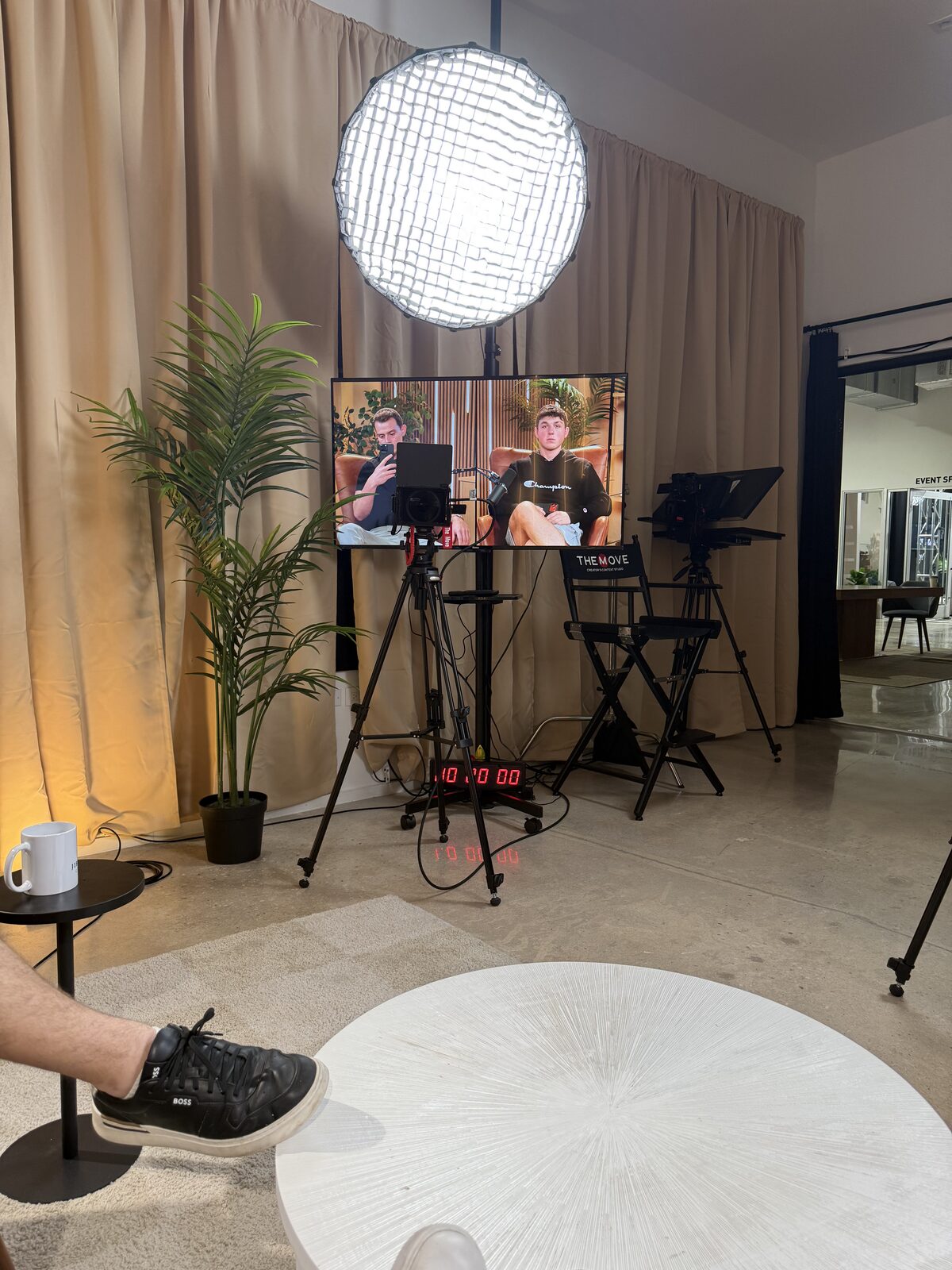 Crasto Media content studio set with lighting, teleprompter, and cameras during a client shoot